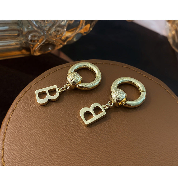 Hollow B letter tide earrings